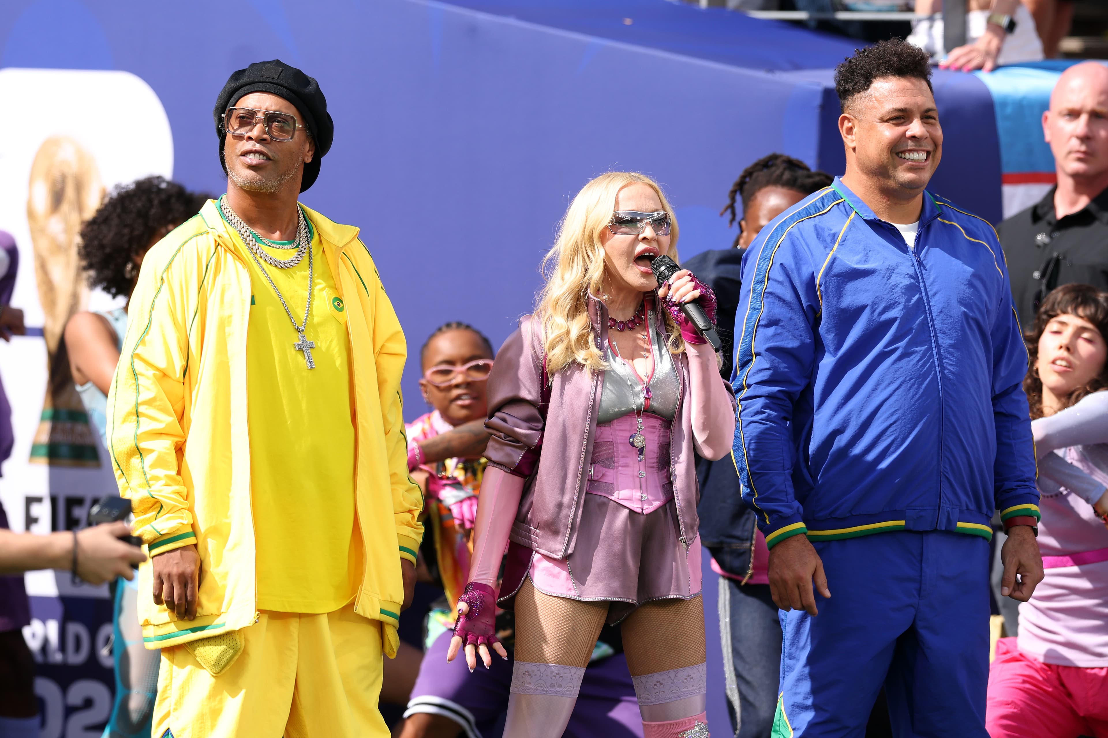 Madonna, BTS, Justin Bieber and Shakira Join Forces for Blink-and-You’ll-Miss-‘Em Moments in a Cluster-FIFA of a Halftime Show cover image